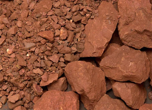 high-grade natural bauxite ore rocks with rough reddish-brown texture