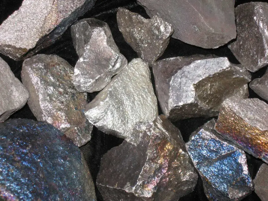 manganese ore rocks with dark gray mineral texture and rugged stone surface